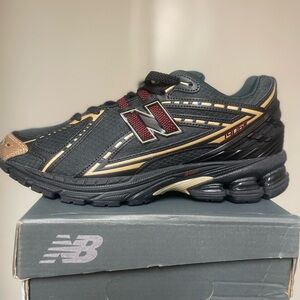 New Balance 1906R Black and Gold Sneakers